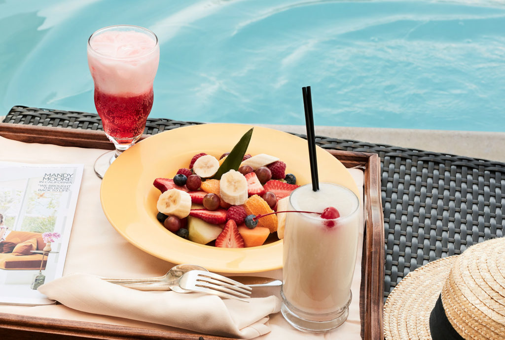 Fresh fruit, Italian soda, and a pina colada from the outdoor pool at the Little America Hotel in Cheyenne, Wyoming.