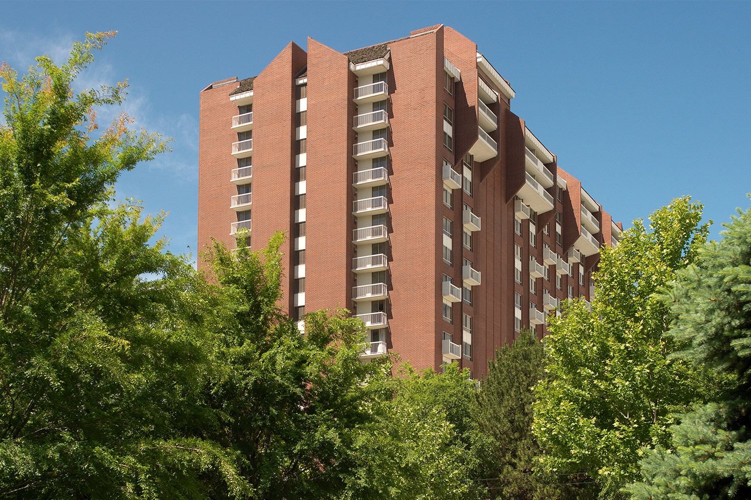 Exterior photo of the Little America Hotel main tower building