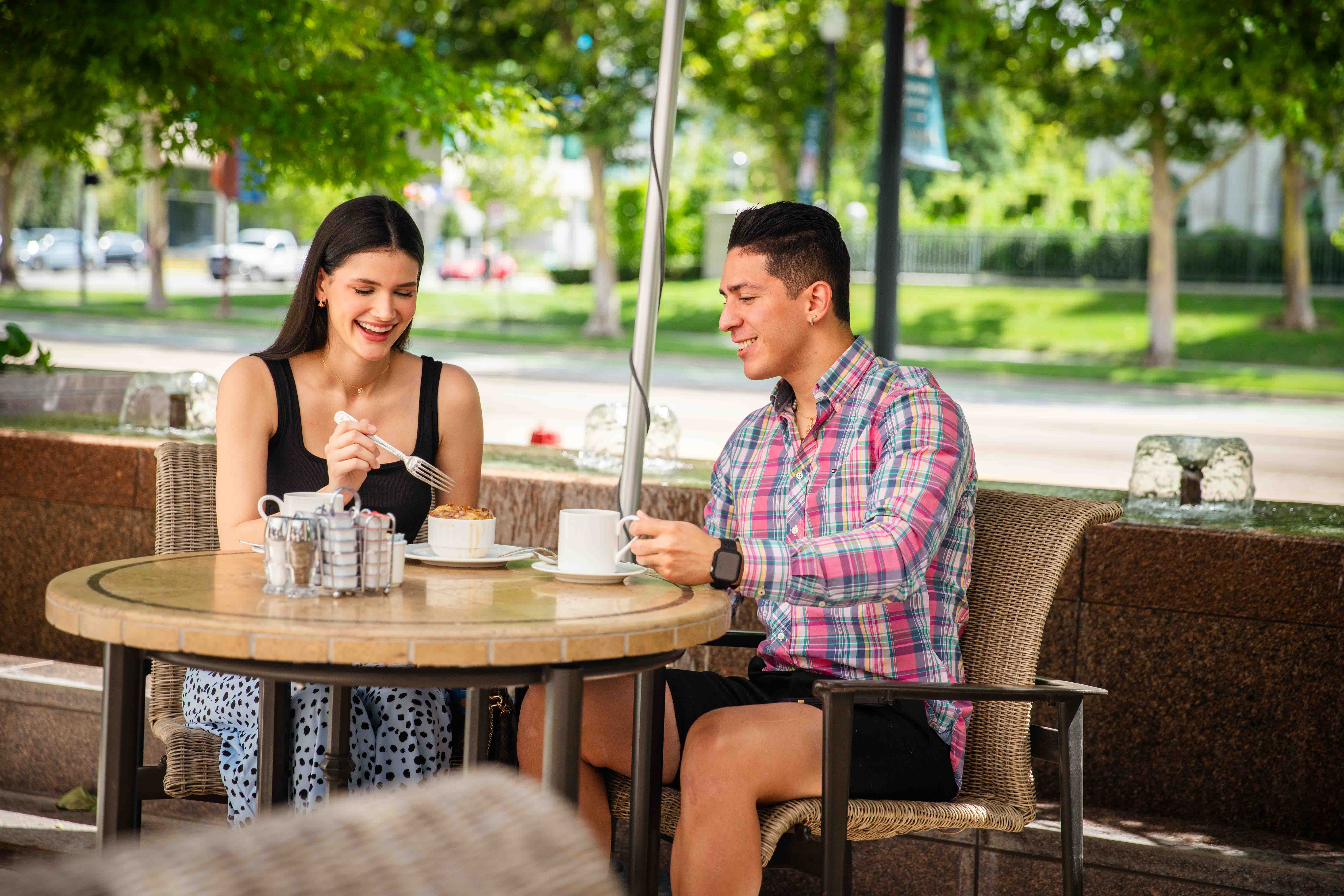Couple dines on the Coffee Shop's outdoor patio